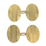 A pair of early 20th century 18ct gold engine turned cufflinks.Hallmarks for London, 1937.