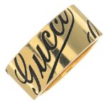 An 18ct gold band ring, by Gucci.