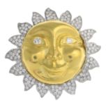 A sun brooch, set with diamonds.Total diamond weight 2cts, signed to reverse.Length 4.2cms.