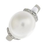 A cultured pearl and diamond ring.Diameter of cultured pearl 10.2mms.