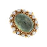 A 14ct gold green tourmaline and split pearl dress ring.Dutch marks.Ring size M.