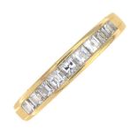 An 18ct gold diamond half eternity ring.Total diamond weight 0.70ct, stamped to band.