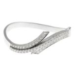 A bangle, set with brilliant-cut diamonds.Estimated total diamond weight 2cts.