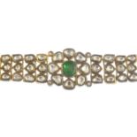 A diamond, emerald and enamel bracelet.