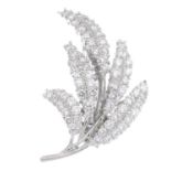 A diamond foliate brooch.Estimated total diamond weight 1ct.