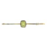 An early 20th century silver and gold peridot and diamond bar brooch.Length 5.1cms.