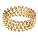 A mid 20th century 15ct gold expandable bracelet.Inner diameter 3 to 8cms.