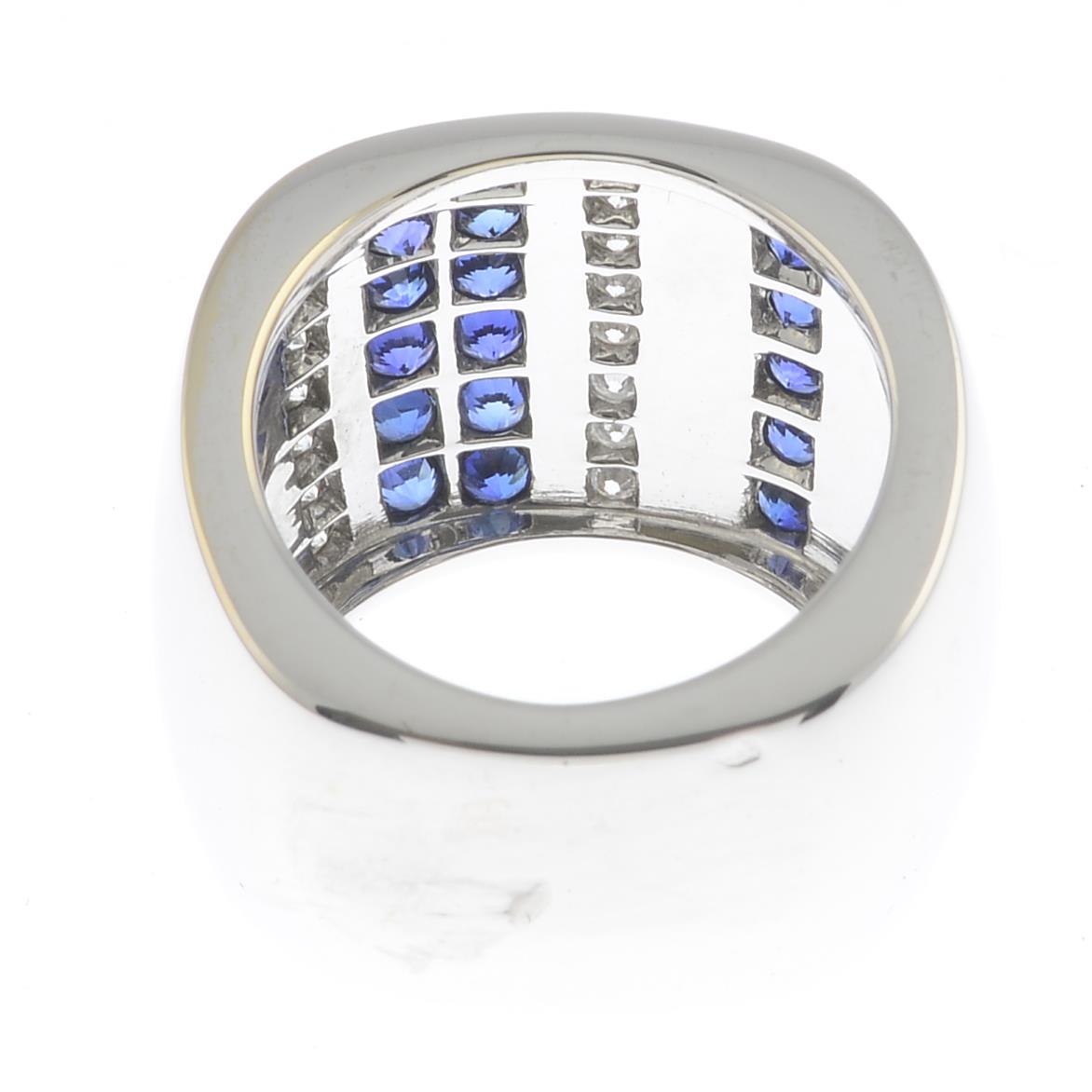 An 18ct gold sapphire and diamond dress ring. - Image 2 of 3