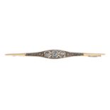 An early 20th century 14ct gold diamond bar brooch.Dutch assay marks.Length 7.2cms.