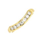 An 18ct gold diamond half eternity ring.Estimated total diamond weight 0.25ct.Hallmarks for London,