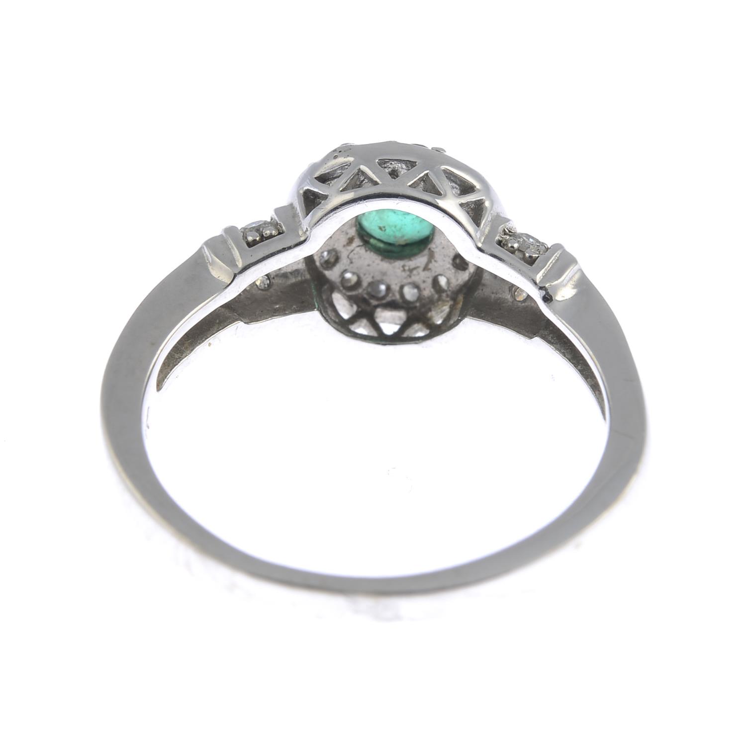 An emerald and diamond cluster ring.Estimated total diamond weight 0.20ct. - Image 3 of 3