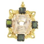 A pinkish orange topaz and green tourmaline pendant.With report 79187-19,
