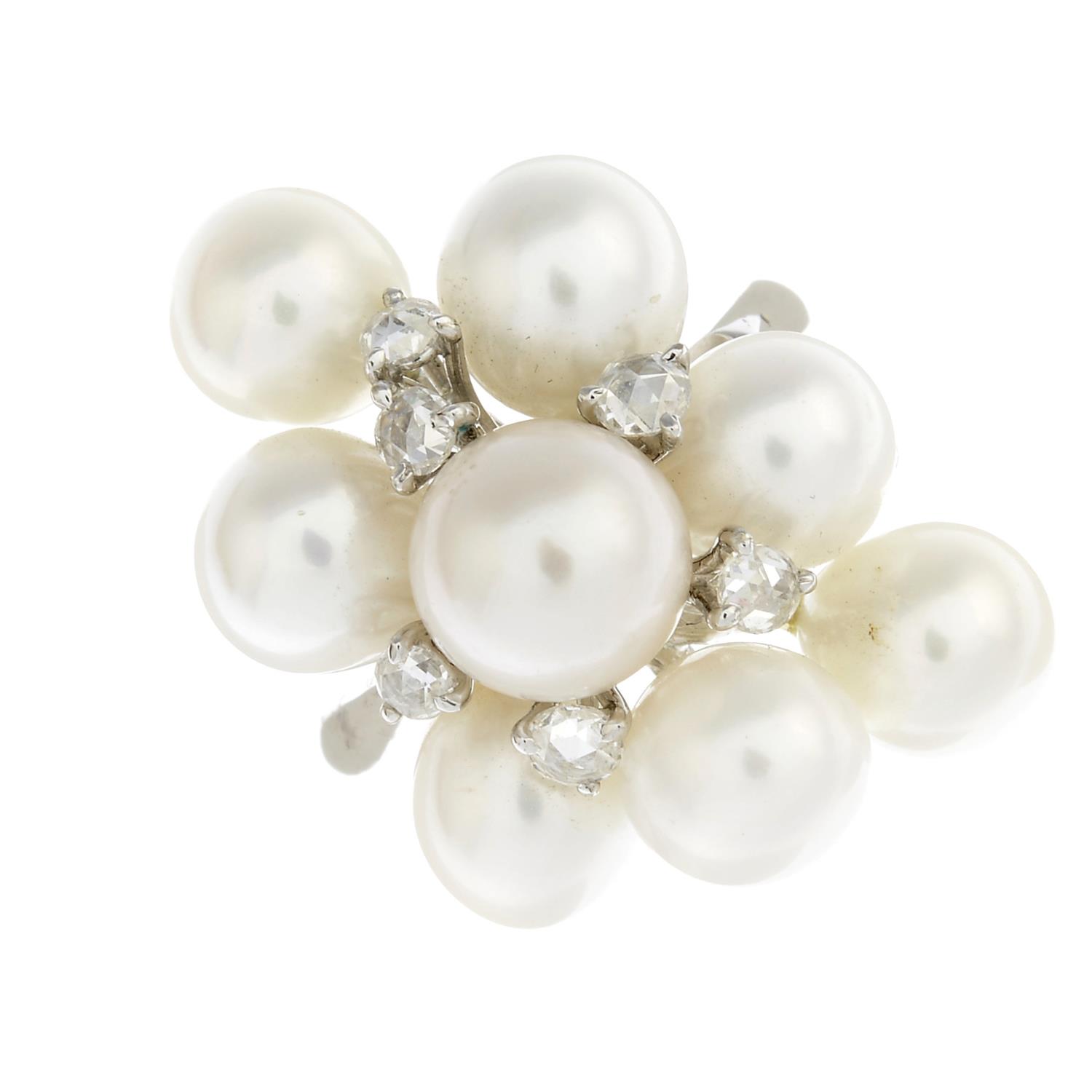 A cultured pearl and diamond dress ring.Estimated diameters of cultured pearls 8 to 7mms.