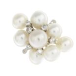 A cultured pearl and diamond dress ring.Estimated diameters of cultured pearls 8 to 7mms.