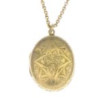 An early 20th century 15ct gold engraved locket,