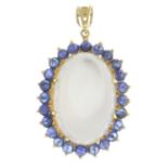 A moonstone and sapphire cabochon cluster pendant.Estimated dimensions of moonstone 20 by 13.3 by