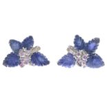 A pair of earrings, variously set with carved sapphire petals, pink sapphire and diamonds.