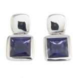 A pair of iolite single-stone earrings.Signed Ritz London.Iolite calculated total weight 3.80cts,