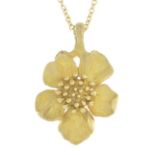 An 18ct gold flower pendant,