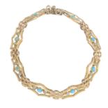 An early 20th century 9ct gold turquoise and split pearl bracelet.Stamped 9c.