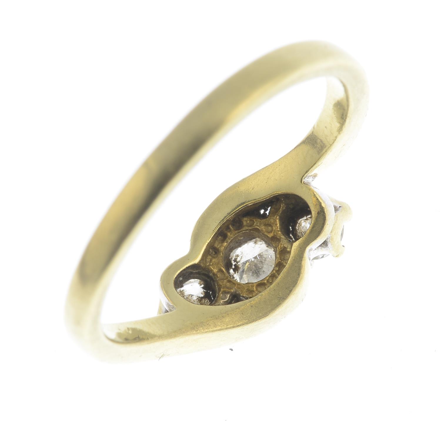 An 18ct gold diamond three-stone ring. - Image 3 of 3