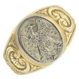 A gentleman's 18ct gold engraved, bi-colour signet ring.Italian marks.Ring size W.