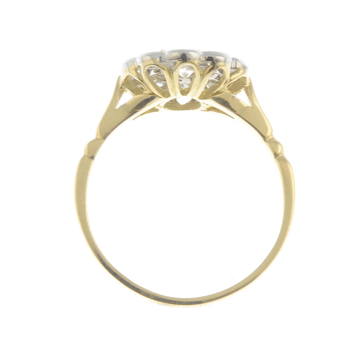 A diamond cluster ring.Total diamond weight 0.65ct. - Image 3 of 3
