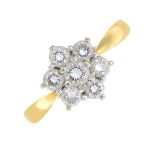 An 18ct gold diamond cluster ring.Estimated total diamond weight 0.65ct.