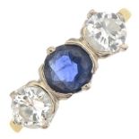 An 18ct gold diamond and sapphire three-stone ring.Estimated total diamond weight 0.80ct,