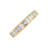 A diamond half eternity ring.Estimated total diamond weight 0.60ct.Stamped 750.