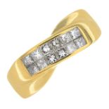 An 18ct gold diamond dress ring.Total diamond weight 0.64ct,