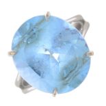 A blue topaz single-stone ring.