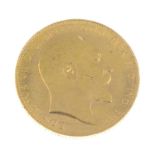 (64850) A full sovereign coin, dated 1908.Length 2.2cms.