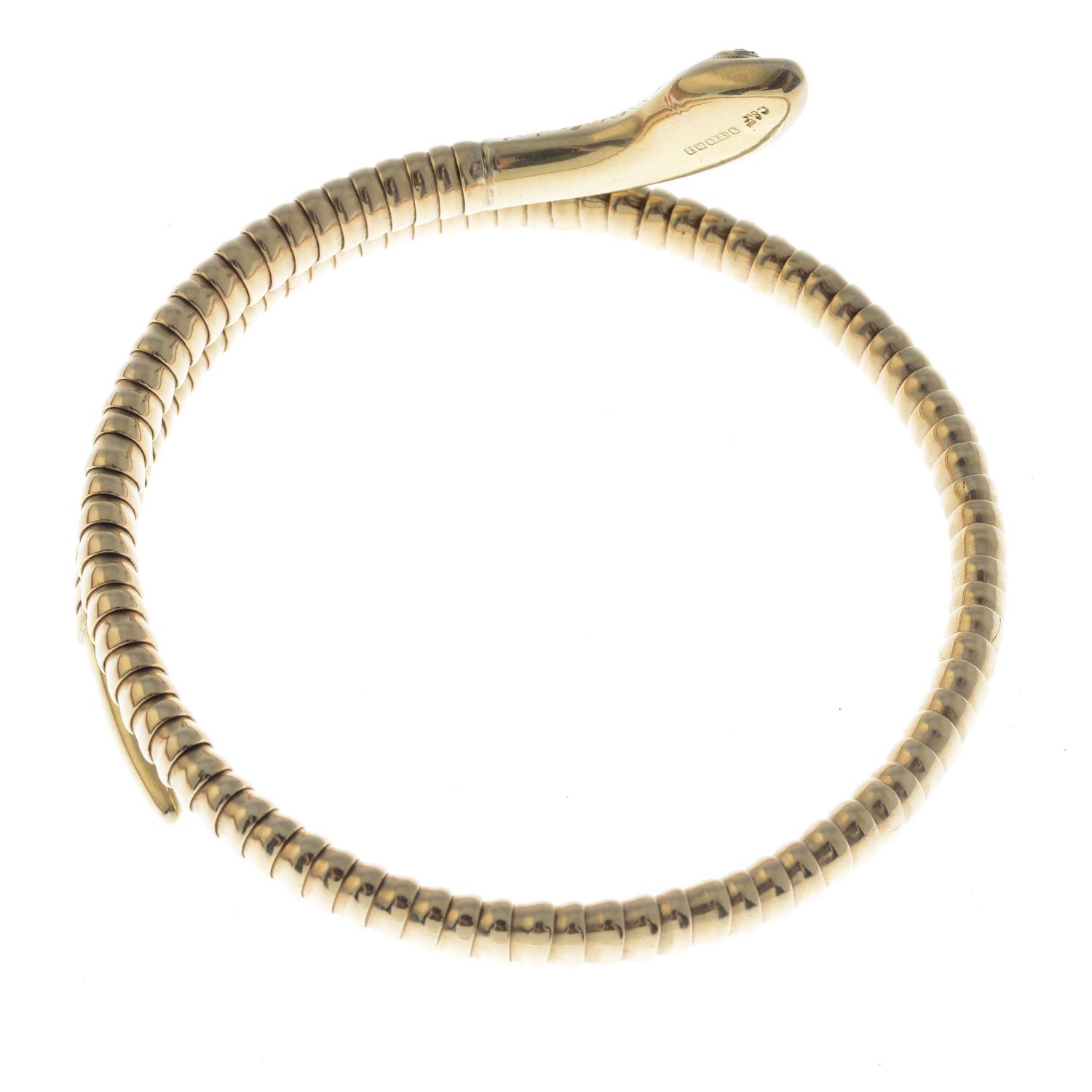 A mid 20th century 9ct gold ruby flexible snake bangle.Maker's mark for Cropp & Farr.Hallmarks for - Image 2 of 2