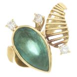 An emerald and diamond ring.Emerald calculated weight 2.50cts,