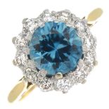 A blue zircon and diamond cluster ring.Zircon weight 1.93cts.