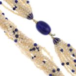 A seed pearl and lapis lazuli multi-strand necklace.Stamped 750, to the clasp.Length 39cms.