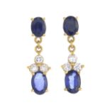 A pair of sapphire and diamond earrings.Estimated total diamond weight 0.15ct.