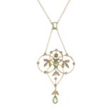 An early 20th century gold peridot and split pearl necklace.One split pearl deficient.Stamped