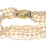 A cultured pearl necklace, with a diamond clasp.