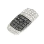 An 18ct gold diamond and black gem full eternity ring,