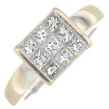 A diamond cluster ring.Total diamond weight 0.50ct, stamped to band.