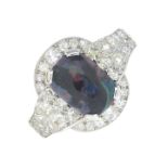 A black opal and diamond cluster ring.