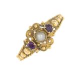 An early 20th century gold ruby and split pearl ring.Ring size Q.