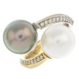 A cultured pearl and diamond dress ring.Approximate cultured pearl dimensions 11mm and