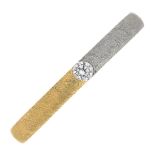 An 18ct gold and platinum diamond single-stone textured ring.Diamond weight 0.05ct,