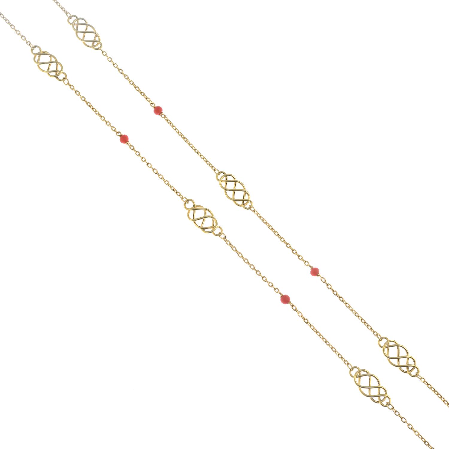 An 18ct gold coral necklace.Hallmarks for Sheffield, 1975.