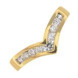 An 18ct gold diamond chevron ring.Estimated total diamond weight 0.40ct.Import marks for