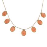 A coral cameo necklace, with later chain.Length 44cms.