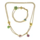 A necklace and bracelet, with floral and heart-shape enamel highlights.